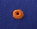 Contrast thread eyelets